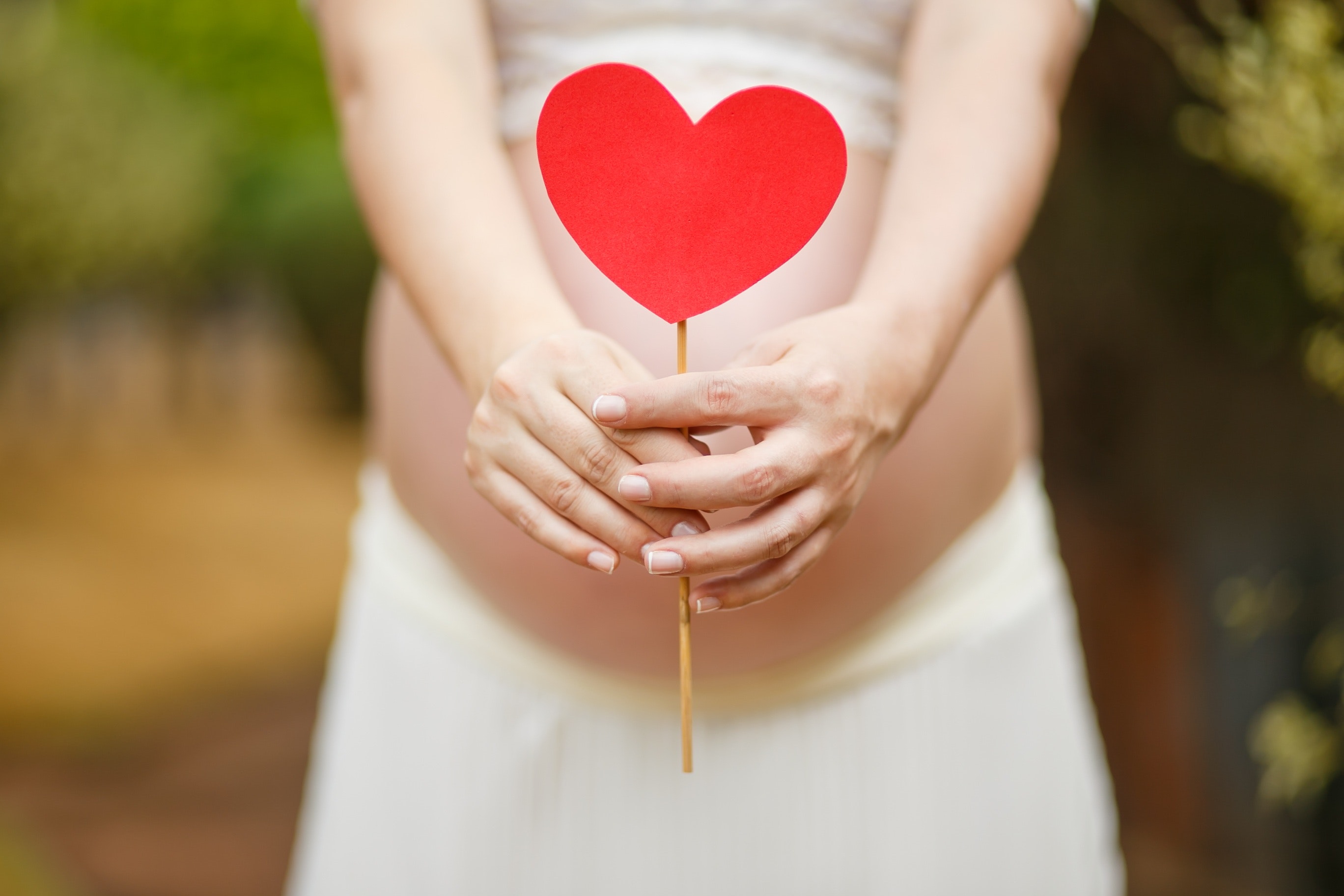 women is carrying a baby