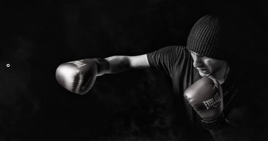 a boxer wearing dark clothes